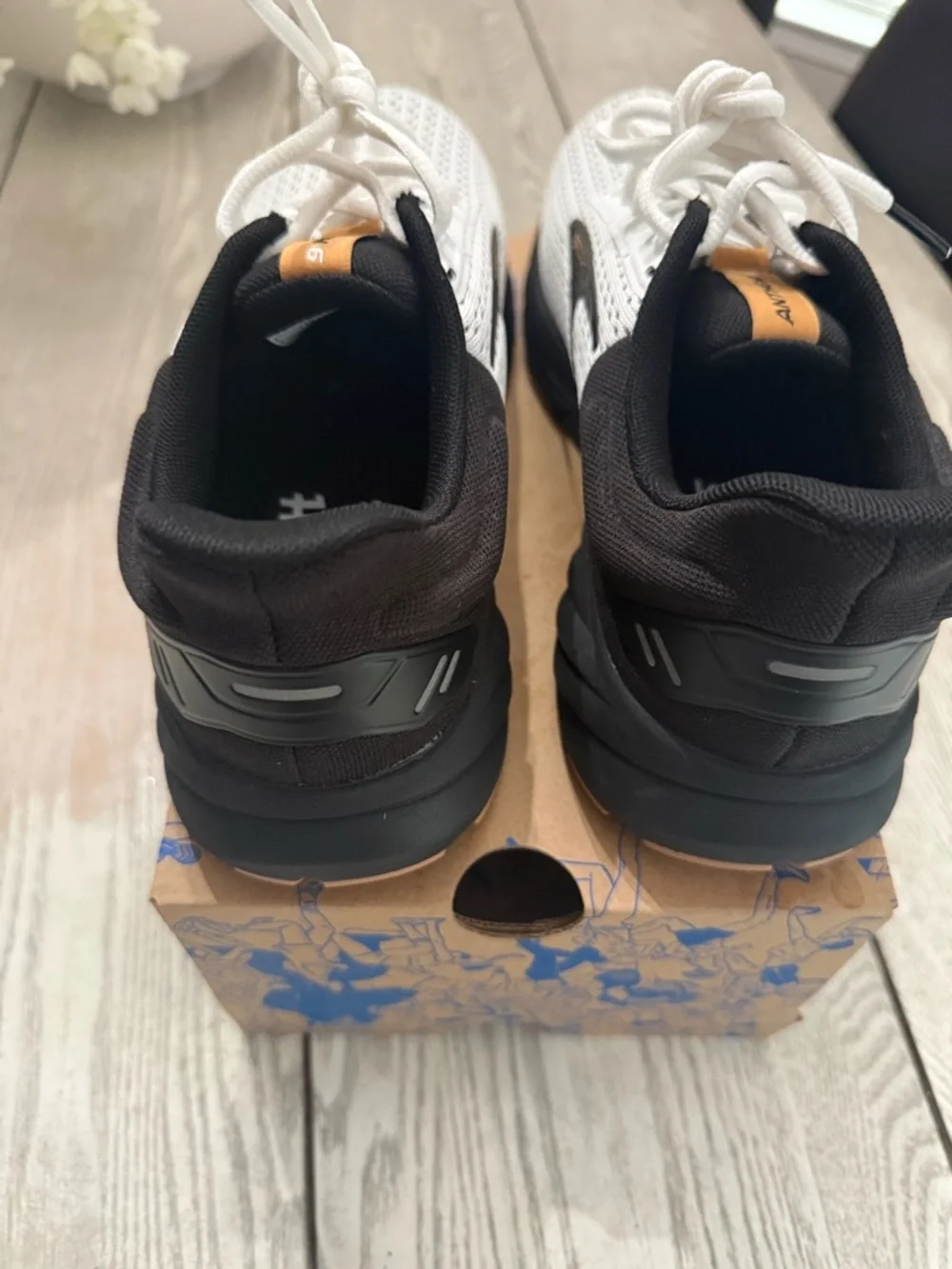 Brooks White and Black Athletic Running Sneakers with Orange Accents